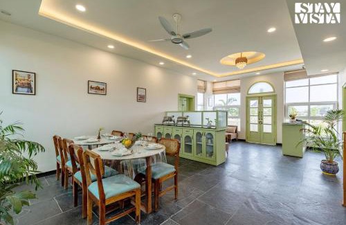 Amer Villa | The Pastel Courtyard with Pvt Pool & Garden at Jaipur by StayVista