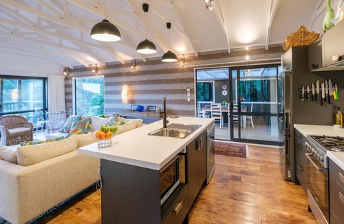 Omiha House | The Pavilion, Ōmiha - Welcome to The Pavilion, Ōmiha, a stunning premium holiday home nestled in the picturesque surroundings of unspoiled Ōmiha, a sanctuary for the island's native birdlife and flora. This exquisite two-bedroom, two-bathroom retreat
