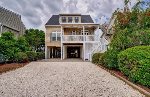 Ocean Isle Beach Cottage | The Perfect Getaway! Dock, King Suite, Pet & Family Friendly