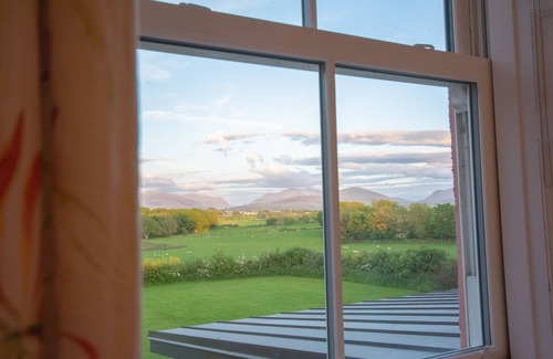 Llanfairpwllgwyngyll Apartment | The Pink House - A stunning family home with spectacular views of Snowodnia