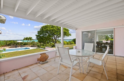 George Town House | The Pink House vacation rental, magnificent pool and view over Elizabeth harbor