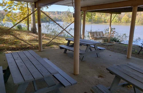 Cannelton Cabin | The Point is a waterfront rental with covered boat dock at Rocky Point Indiana