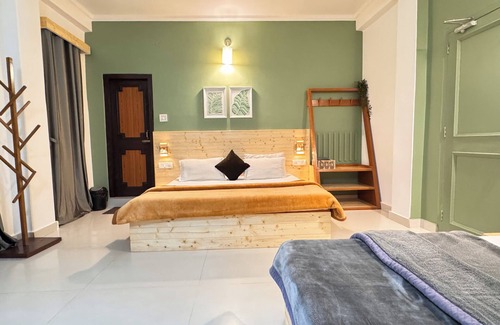 Bajaura Hotel | The Royal Orchard Kasol