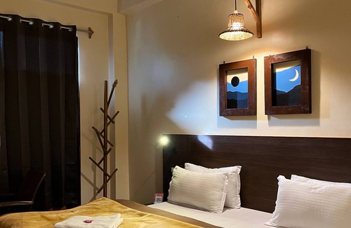Bajaura Hotel | The Royal Orchard Kasol