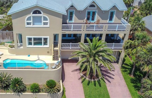 Butler Beach House | The Sand Castle Heated Pool Atlantic Ocean
