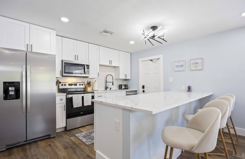 Cocoa Beach Apartment | The Shark Tank: Coastal Modern, Walk to Beach, Shops & Downtown Cocoa Beach