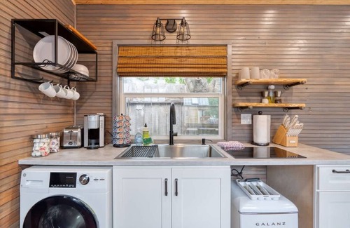 Hosford-Abernethy House | The Sunstone Modern Tiny House Prime Location