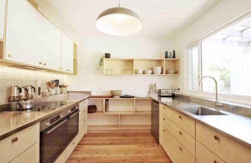 Cudmirrah House | The Swan House - Beautiful big five bedroom beach house. Fire pit, pet friendly!