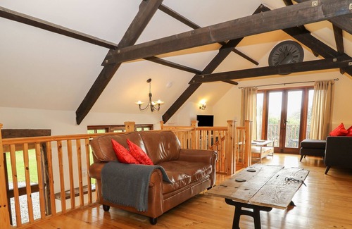 Sticklepath Cottage | THE THRESHING BARN, romantic, with pool in Okehampton