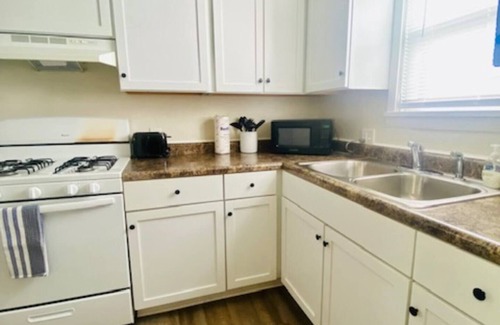 Green Bay Apartment | The Tiny Piney Loft - Live. Work. Play. Downtown Green Bay!