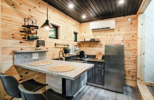 Charlevoix House | The Treehouse escape is set amidst 55 acres of natural beauty