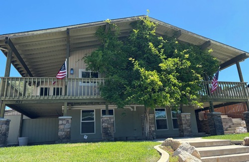 Sunset Heights House | The Treehouse: Spacious Retreat with Theater Room, Fire Pit & Mountain Views