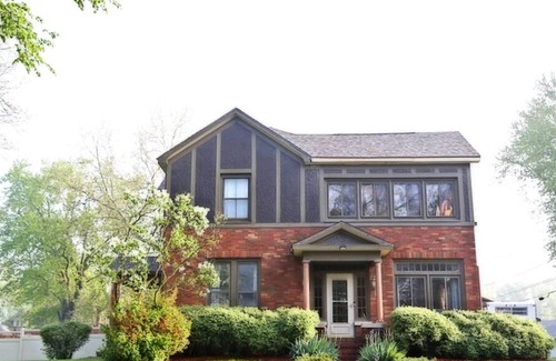 Oskaloosa House | The Tudor; Pool, Fire Pit, Patio, Near Hiking and Bike Trails; Bike Rental near.