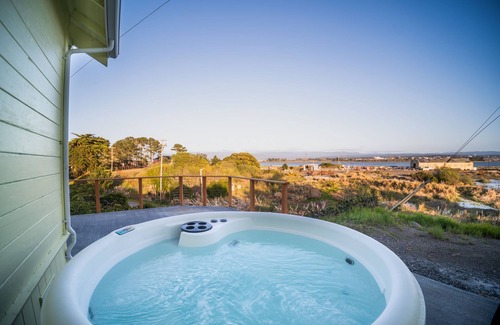 Eureka House | The View: a 3-bed pet-friendly beach cottage in Samoa with hot tub & bay views