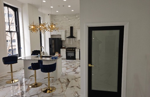 West Main Historic District Condo | The Winston on Market - Private Luxury Rental Space