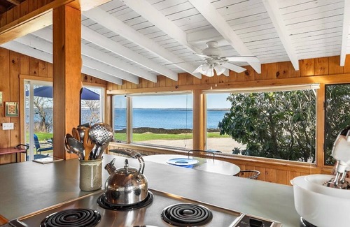 Mid-Coast and Islands Cottage | The Yellow Cottage is a 2-bedroom little getaway located right on Cedar Beach.