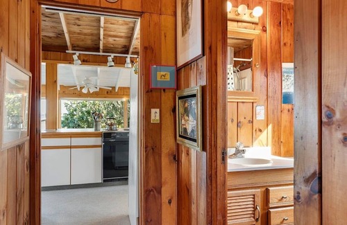 Mid-Coast and Islands Cottage | The Yellow Cottage is a 2-bedroom little getaway located right on Cedar Beach.