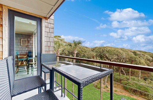 West Beach Village Villa | Third floor home with stunning private-deck ocean views - steps from beach