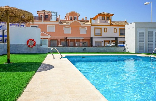 San Juan de los Terreros House | This beautiful Andalusian vacation home welcomes you with community pool near the beach.