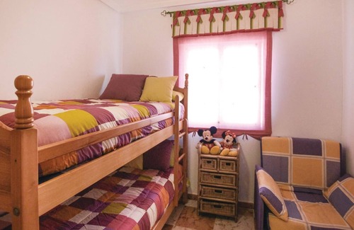 La Marina House | This beautiful vacation townhouse in La Marina, on the Costa Blanca, offers access to a communal poo