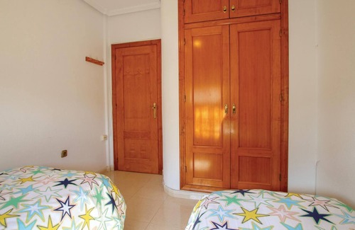 La Marina House | This beautiful vacation townhouse in La Marina on the Costa Blanca offers access to a communal pool