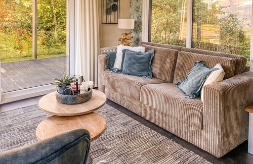 Oosterwolde House | This beautifully decorated vacation home is located in an inviting vacation park, the centerpiece of