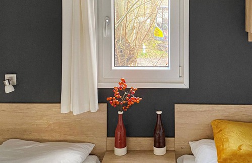 Oosterwolde House | This beautifully decorated vacation home is located in an inviting vacation park, the centerpiece of