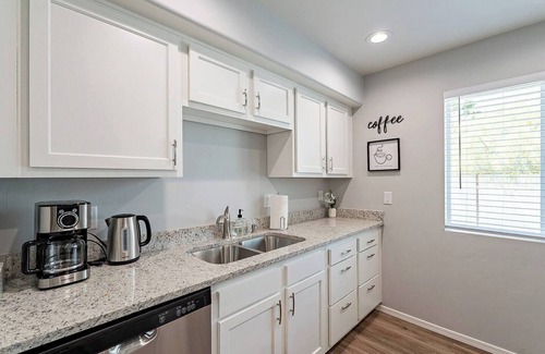 Amphi Apartment | This centrally located 1 bedroom 2 bathroom is fully remodeled with electric vehicle charging on site