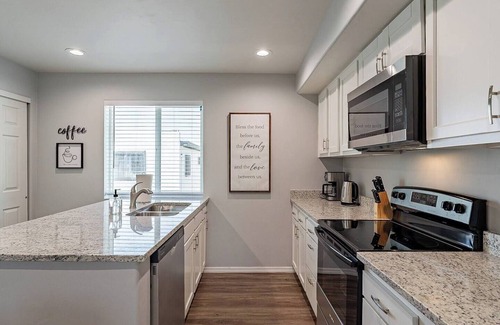 Amphi Apartment | This centrally located 2 bedroom 2 bathroom is fully remodeled with electric vehicle charging on site