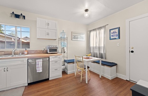 Ventura House | This charming two-bedroom, one-bath duplex is your ideal coastal retreat, offering an authentic beach town experience just a short distance from the water.