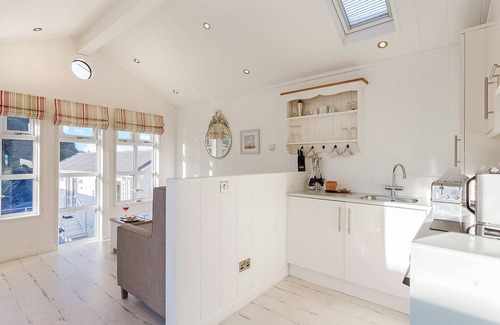 Hele Ski Chalet | This chic country style beach hut is ideal for a romantic escape by the sea.