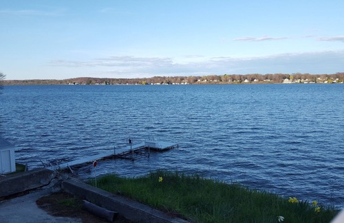 Ludington House | This Cottage offers dramatic views of Hamlin Lake with 150 feet of lakefront
