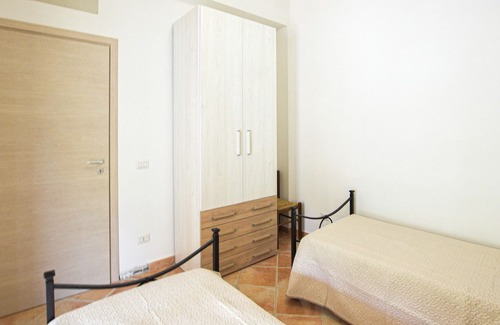 Tresnuraghes Apartment | This cozy cottage is the ideal place for a relaxing vacation.