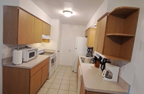 Port Malabar House | This cozy house is family and pet friendly.