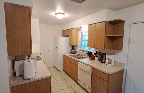 Port Malabar House | This cozy house is family and pet friendly.