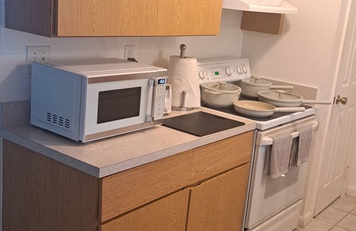 Port Malabar House | This cozy house is family and pet friendly.