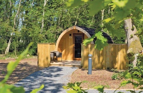 Alford Cottage | This Deluxe Couples Pod with a sauna is made for romantic getaways.