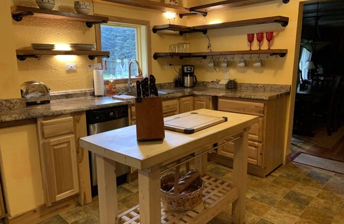 Ashford Cabin | This historic cabin is just a few miles from Mt Rainier National Park. Pet friendly. Fish pond, pastures, old cedars, 11-acres. Private hot tub surrounded by grove of old cedars.