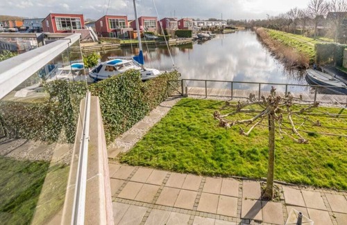 Oude-Tonge House | This house is completely surrounded by a fence and it has a trampoline, perfect for children. Beauti