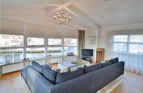 Workum House | This inviting and comfortable villa is located right on the water.