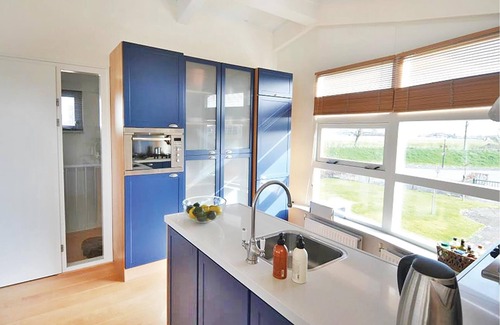 Workum House | This inviting and comfortable villa is located right on the water.