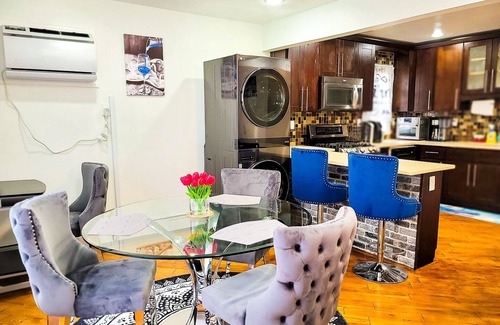 Queens Apartment | This luxury space is a cozy 2 BDR with shared common space fully furnished!n