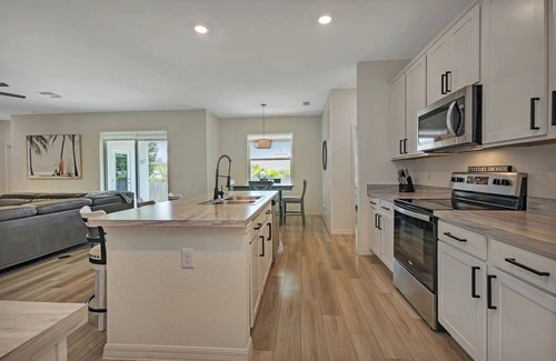 Port Charlotte House | This modern spacious and well decorated 5 beds house is an ideal place to relax!