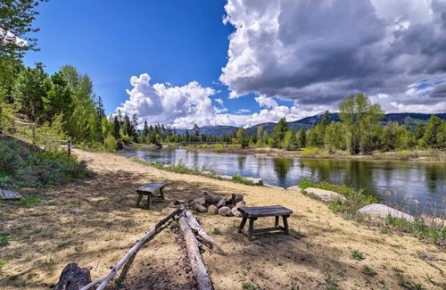 Tamarack Resort Apartment | This private riverfront escape near McCall sleeps 22+! Bar/game room, huge kitchen/dining. Between Tamarack & Brundage, with ride-out snowmobile trail access. Cozy fireplace & big TVs for sports fans.