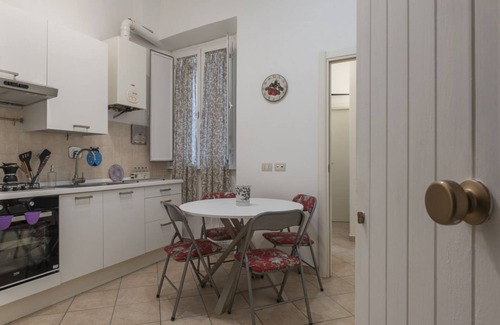 Salario Apartment | This spacious 55sqm apartment with four bedrooms is able to accommodate up to 8 people. Located on the first floor (with elevator not suitable for disabled) of a restored period building, the apartment overlooks the private park of Villa Albani, one of t