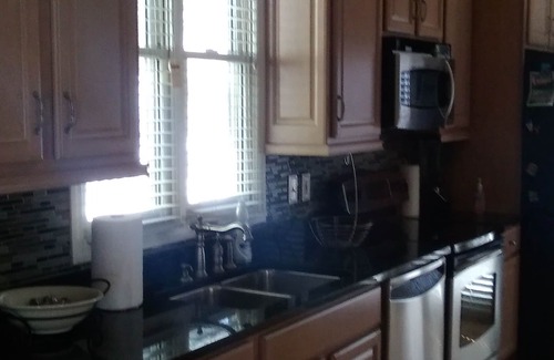 MLK University House | This two story 4br home Victorian home boast the best location in the city!