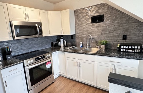 Algiers House | This two-story modern retreat house is the perfect spot to rest and relax