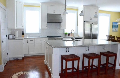 North End Condo | This unit consists of 5 beautifully furnished bedrooms, 3.5 bathrooms, a laundry room/pantry and stainless steel appliances.