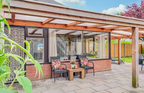 Stavenisse House | This vacation home in Zeeland is in a beautiful location near the water.