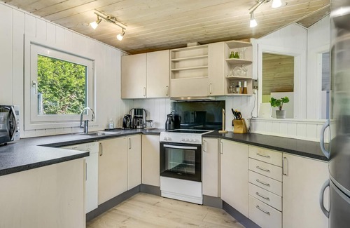 Udsholt House | This vacation home is located in an exclusive vacation home area.